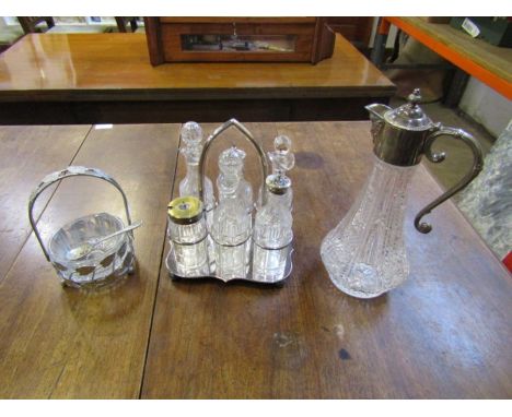 Glass and silver plated sugar bowl with stand and spoon, condiment set and Claret jug 