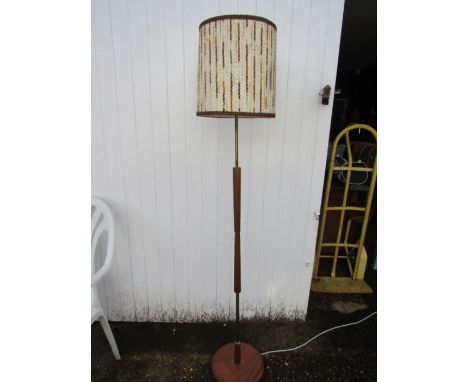 A retro teak standard lamp