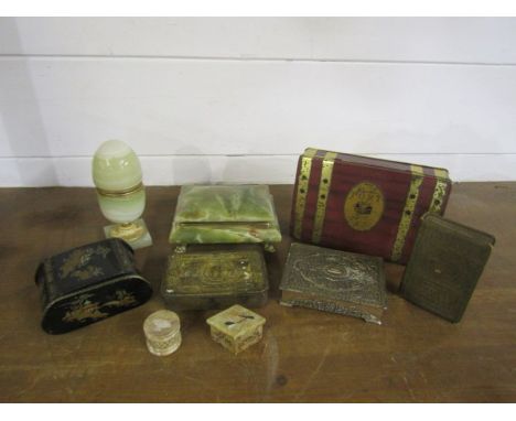 Collectors lot including onyx boxes and table lighter, vintage tins and savings bank