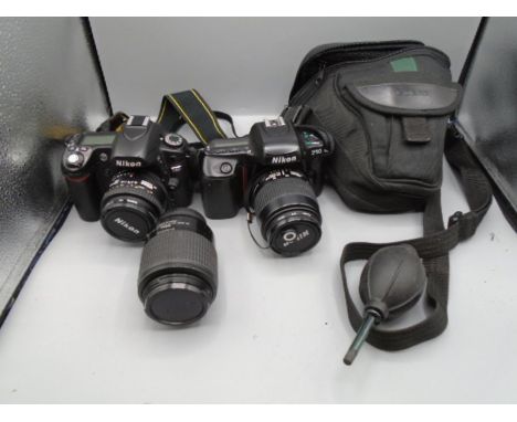 one Nikon D80 Camera, one Nikon F50 Camera and one Nikon DX lens etc