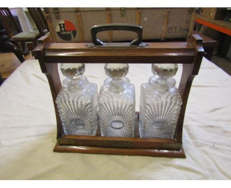 Vintage Oak Tantalus with 3 glass decanters and key