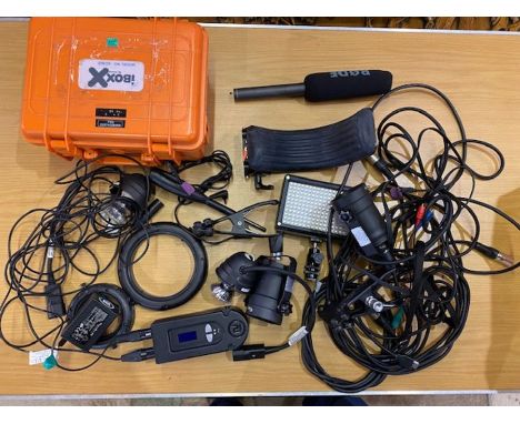 Box of photographic lighting including stage lights and ring light.