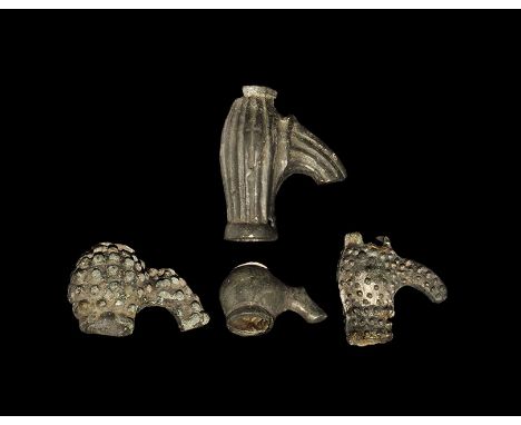 13th-14th century AD. A mixed group of Eastern European cast tubular finials comprising: one barrel-shaped with vertical ribs