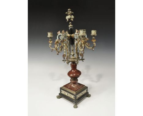 19th-early 20th century AD. A tall candelabrum with square-section base and claw feet, marble socket and bulbous stem, six ra
