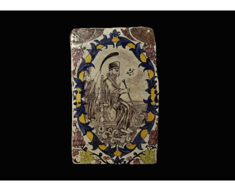 Qajar Dynasty, 1794-1925 AD. A rectangular white-glazed ceramic tile with polychrome glazed design; the central motif an elli