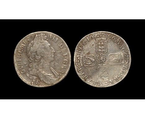 Dated 1696 AD. First bust. Obv: profile bust with 'E' below for Exeter mint and GVLIELMVS III DEI GRA legend. Rev: cruciform 