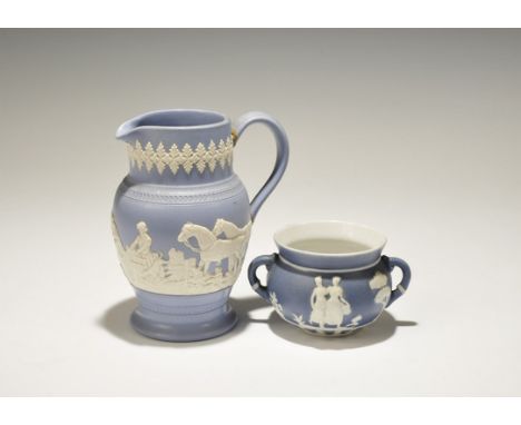 20th century AD. A mixed group of ceramic vessels comprising: a squat bowl with flared rim and two loop handles, reserved whi