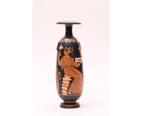 Greek, Apulia, alabastron, mid 4th century BC, depicting a seated woman wearing a chiton, looking over her shoulder into her 