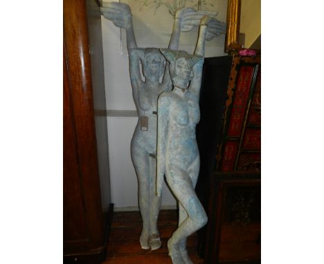 Two life size Egyptian figural nudes, in various poses, finished in dappled light blue, largest 200cm, (2)