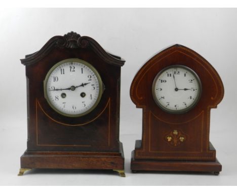 A 20th century mahogany and boxwood inlaid bracket clock, the enamelled dial with Arabic numerals, eight day movement, chimin