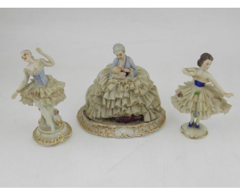 A Dresden porcelain figurine of a ballerina, together with two Italian porcelain figurines, all dressed in glazed crinoline