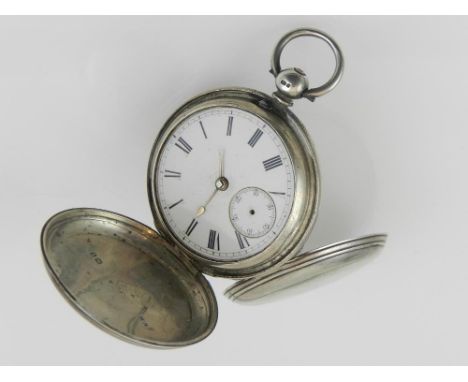 A silver pocket watch, having white enamel dial with Roman Numerals. 