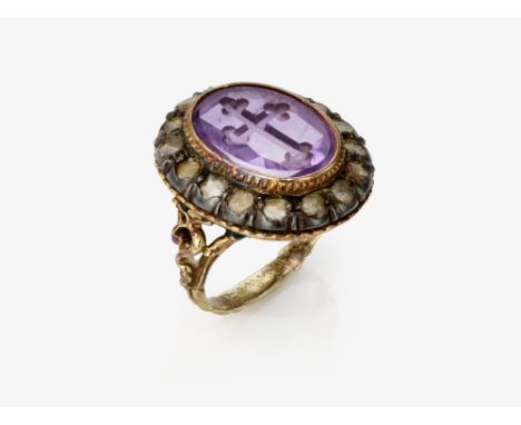 Klerikaler Ring mit Amethyst und Diamantentourage

Um 1780

Gelbgold 585/- und Silber, getestet. 16 kleine Diamantrosen. 1 Am