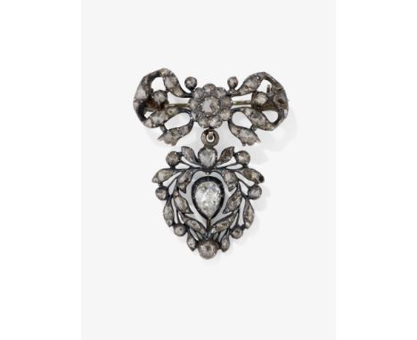 Schleifenförmige Brosche mit herzförmigem Anhänger, besetzt mit Diamanten

Wohl Frankreich, um 1750-1760

Silber, getestet. R