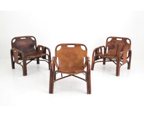 TITO AGNOLI (Lima 1931-Milano 2012). Three Safari model armchairs in bamboo and leather. 70's. Defects and signs of wear over