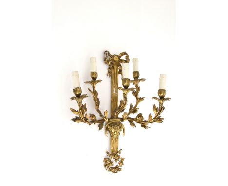 Five light sconces in gilded bronze with faun mask. Early 20th century. 60x40x25 cm approx. Applique cinque luci in bronzo do
