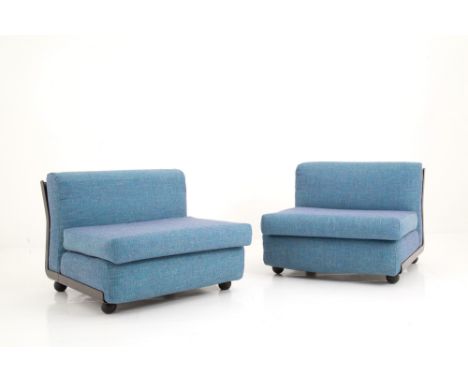 MARIO BELLINI (Milano 1935). Pair of Amanta model armchairs in plastic material with light blue fabric covering. B&amp;B ITAL
