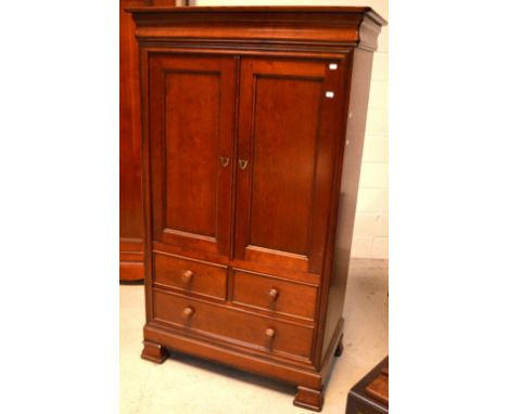 A Simon Horn 'Nursery Furniture' three-drawer chest of drawers, a matching cot bed and a Bridget Forester mahogany tallboy, m
