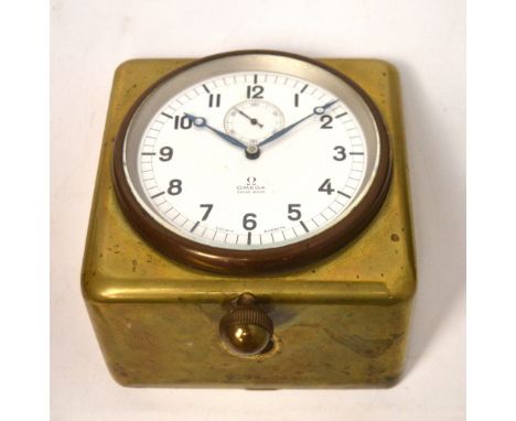 Omega; a large car clock in brass case, white enamel dial set with Arabic numerals and subsidiary seconds dial, marked to fac