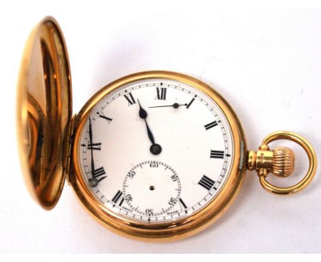 A gentlemen's 9ct gold full hunter pocket watch, enamel dial set with Roman numerals and subsidiary seconds movement, diamete