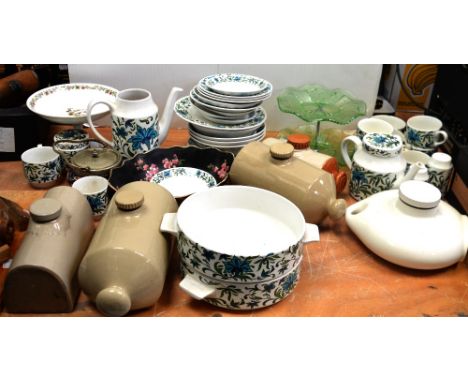 A quantity of Midwinter 'Spanish Garden' pattern tea and dinner ware, a quantity of stoneware hot water bottles, further deco