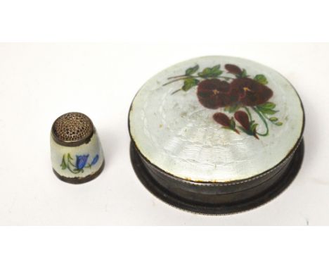 A hallmarked silver enamel small circular box and cover with poppy decoration to the lid, hallmarks rubbed, a similar hallmar