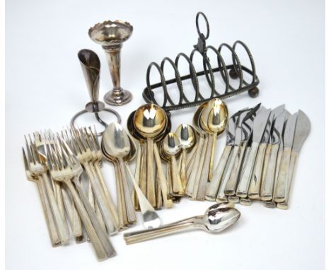 A quantity of silver plated items to include a toast rack, a trumpet case and further plated flatware.