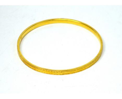 A 9ct gold slave bangle, approx 6.8g