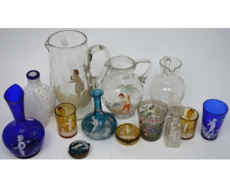 A quantity of clear and coloured glass, most decorated in white enamel in the Mary Gregory style.