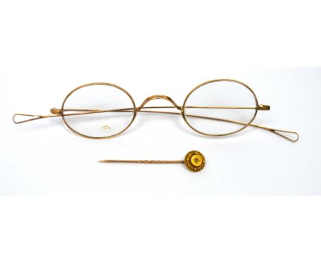 A boxed Victorian Continental 15ct gold stick pin and a pair of 9ct rose gold spectacles (2).