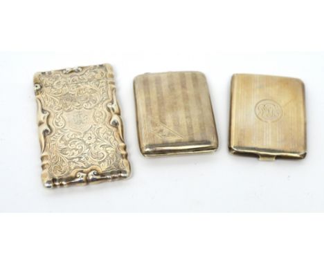 An Edward VII hallmarked silver rectangular card case with repoussé bright-cut floral decoration, central cartouche engraved 