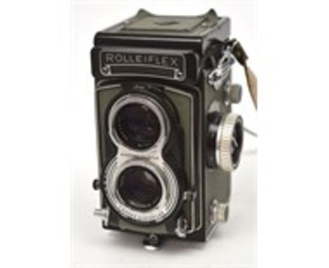 A Franke & Heidecke Rolleiflex camera with Karl Zeiss F:3.5 F-75mm lens, serial no.2148513, with associated case.