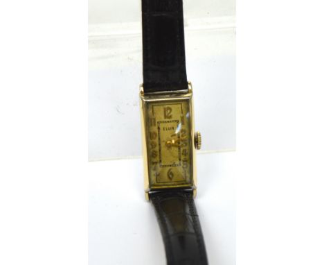Elgin; a 1937 gentlemen's Art Deco tank-style wristwatch, gold-filled and stainless steel case, cream-coloured rectangular di