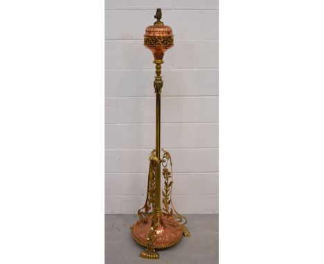 An Arts and Crafts Hinks & Sons Patent copper and brass telescopic floor standing oil lamp with pierced and cast foliate desi