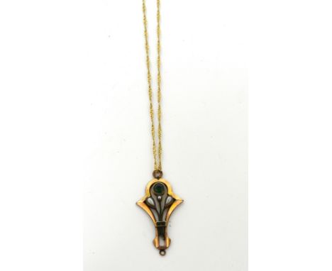 A yellow metal Art Nouveau style pendant set with green stones and simulated pearl on a 9ct yellow gold chain, approx 1g.