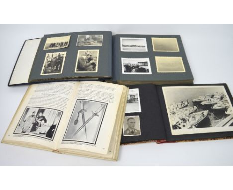 Two interesting Third Reich bound photograph albums containing a quantity of black and white photographs depicting various lo