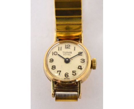 Tudor by Rolex; a 9ct gold ladies' wristwatch, enamel dial marked 'Tudor Royal' and set with Arabic numerals, with a yellow m
