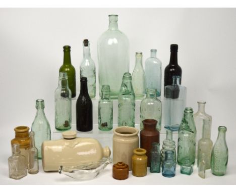 A quantity of glass and stoneware bottles, a bed warmer, ceramic ink wells etc, a full list is available.
