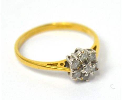 An 18ct yellow gold diamond-set cluster ring, size K 1/2, approx 2.9g.