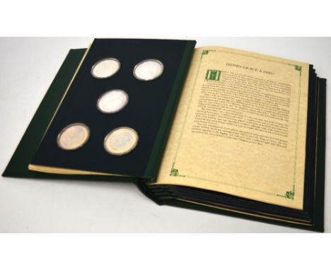 A leather-bound folio of twenty-five medallions 'The Mountbatten Medallic History of Great Britain and the Sea'.