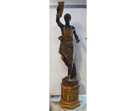 A 20th century gilt-heightened figural Blackamoor lamp stand raised on pedestal base, height approx 205cm, converted to elect