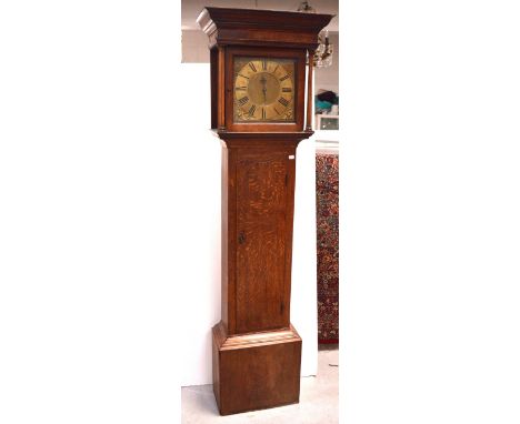 Thomas Clarke; a late 19th century oak longcase clock, gilded dial set with Roman numerals and engraved 'Thomas Clarke, Burto