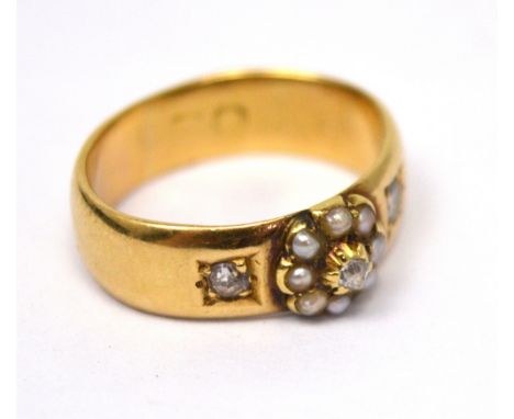 An 18ct yellow gold wedding band with linear bright-cut decoration, size K 1/2, approx 3.5g.