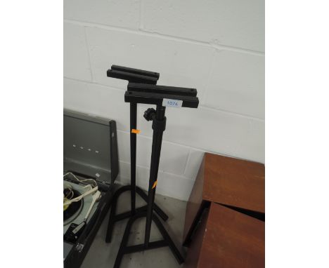 A pair of speaker or lightweight lighting stands