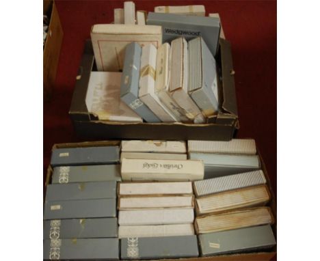 A large collection of assorted boxed collectors' plates to include Royal Worcester