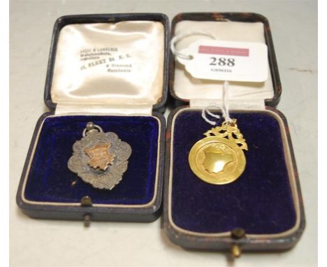 A 9ct gold sporting medal with inscription, 4.1g, and a silver sporting medal (2) Condition Report / Extra Information Northc