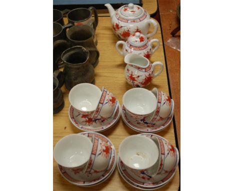 A reproduction Chinese eight place setting tea service