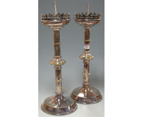 A pair of early 20th century silver plated ecclesiastical pricket candle sticks