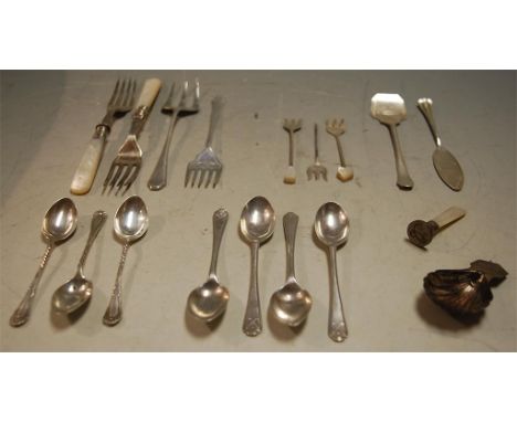 A small collection of George III and later silver flatware to include; teaspoons, salmon forks, silver plated caddy spoon etc