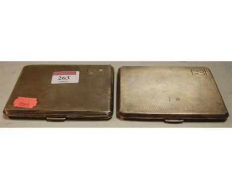 A mid 20th century silver pocket cigarette case with all over engine turned decoration together with one other silver pocket 